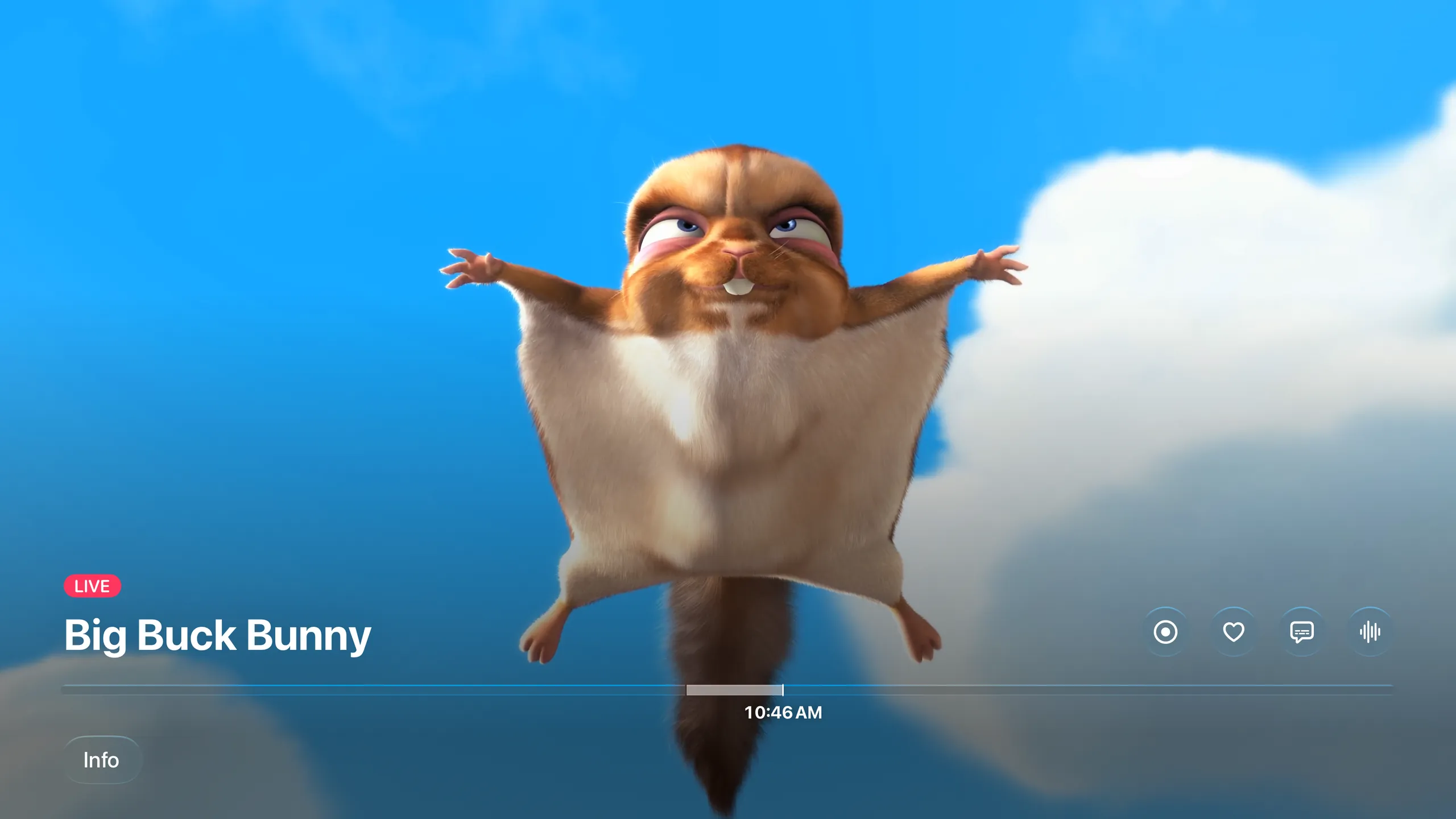 A live channel showing Big Buck Bunny in the native tvOS player: a LIVE mark over the title, the system transport bar at the live edge reading 10:46 AM, an Info button, and round controls for record, favorite, subtitles and audio track
